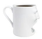 Taza de desayuno, taza de leche y taza de café.